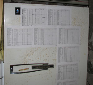 seed charts on freezer door